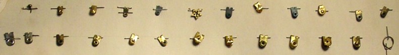 Paper fasteners pinched over edges of papers.jpg (51112 bytes)